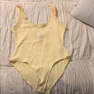 Yellow bodysuit